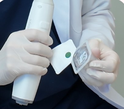 A genuine single-use Potenza tip being unsealed
